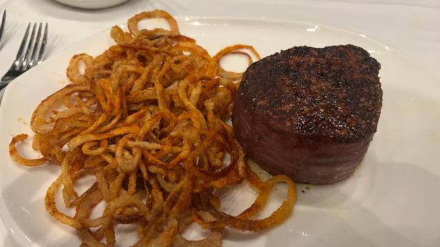 Tony’s of Indianapolis signature dishes Filet MignonSea BassHouse Made Ravioli
